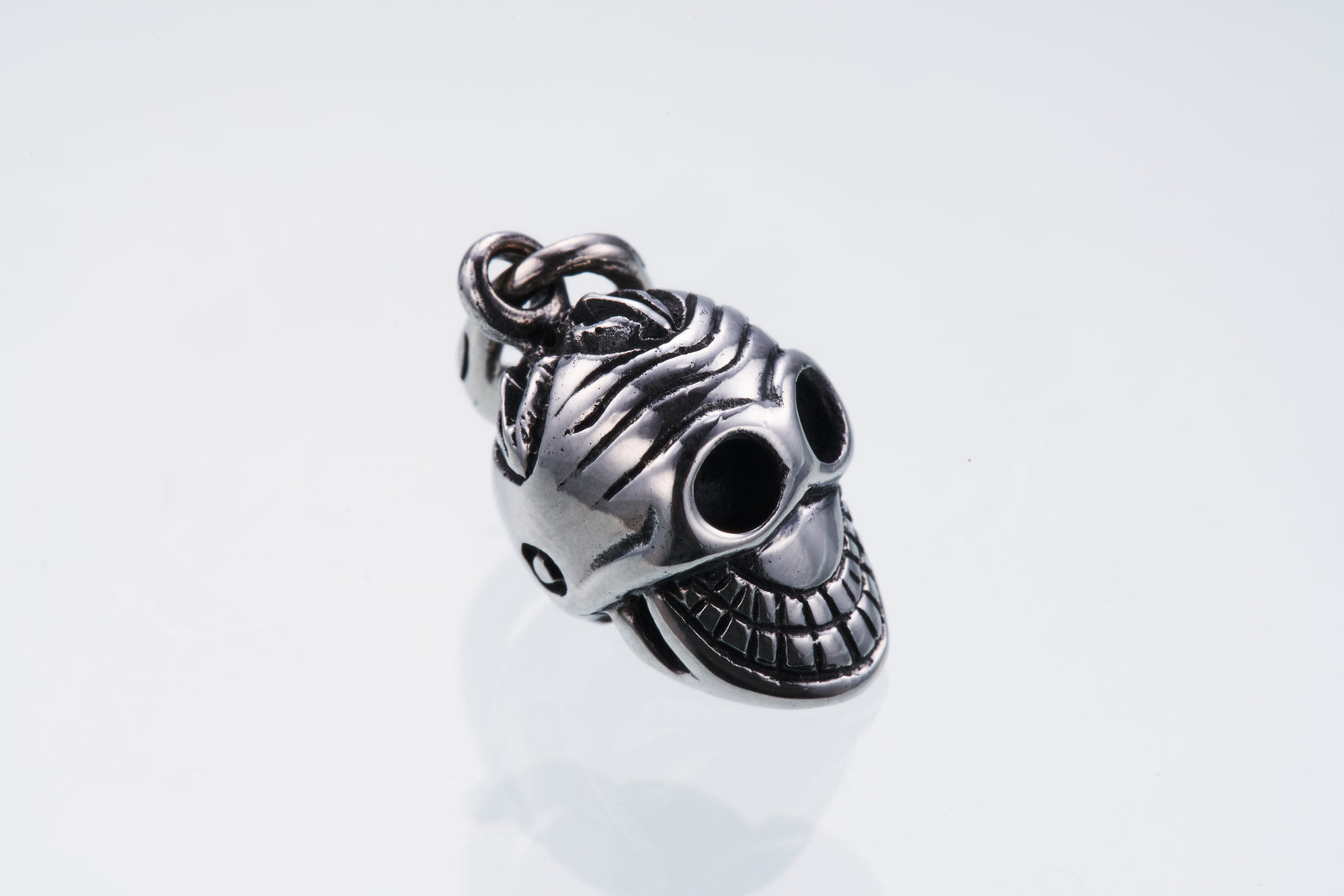 Tibetan Smile Skull Charm｜チベタン・スマイル・スカル
